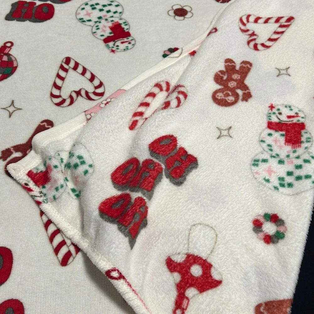 Festive Holiday Blanket with Red and Green Accents used one’s